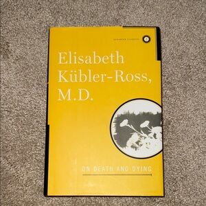 Yellow 'On Death and Dying' Book by Elisabeth Kübler-Ross